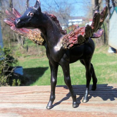 Winged Breyer foal; customized and painted by Airen Chandler.